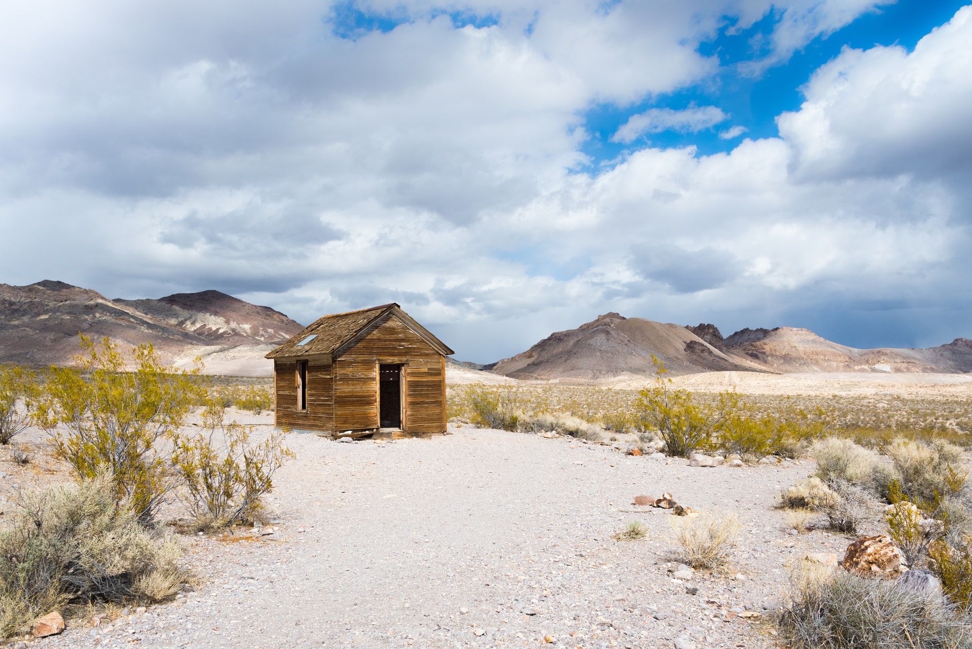 Rhyolite is a ghost town in Nye County, in the U.S. state of Nevada. It is in the Bullfrog Hills, about 120 miles northwest of Las Vegas, near the eastern edge of Death Valley.