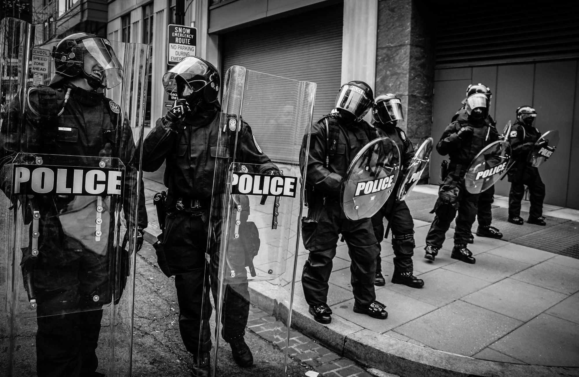 Two police laughing in full riot gear during the presidential inauguration. One of the most poignant photos I took that day.